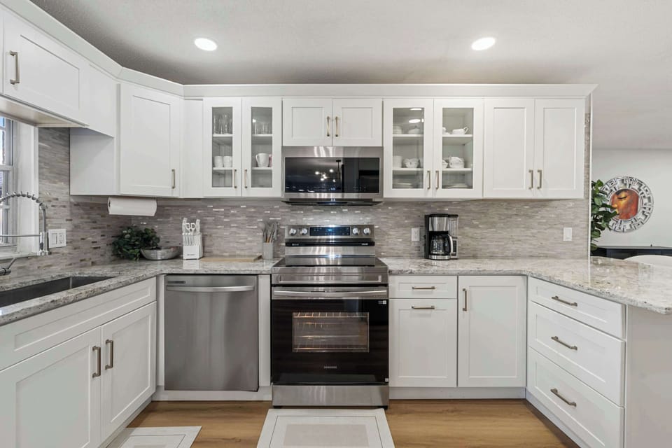 Modern kitchen granite counters stainless appliances Orlando
