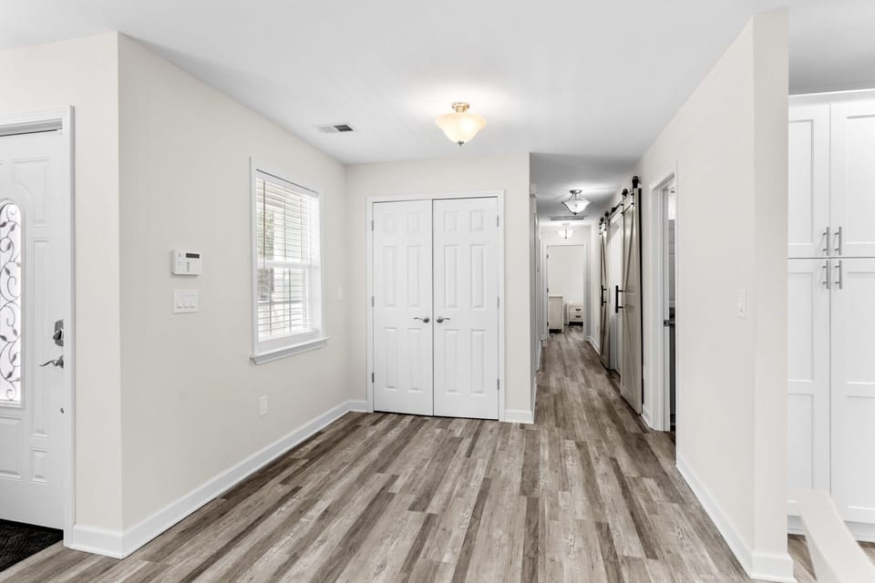 Hallway view from right inside the front entrance.