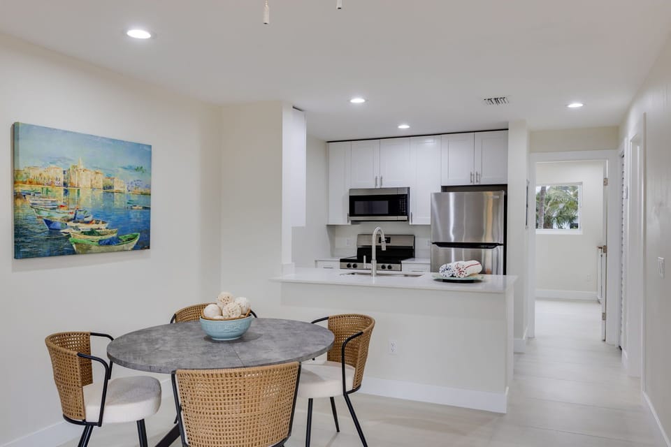 Gorgeous oversized living room, dining area with seating for four, and fully equipped kitchen
