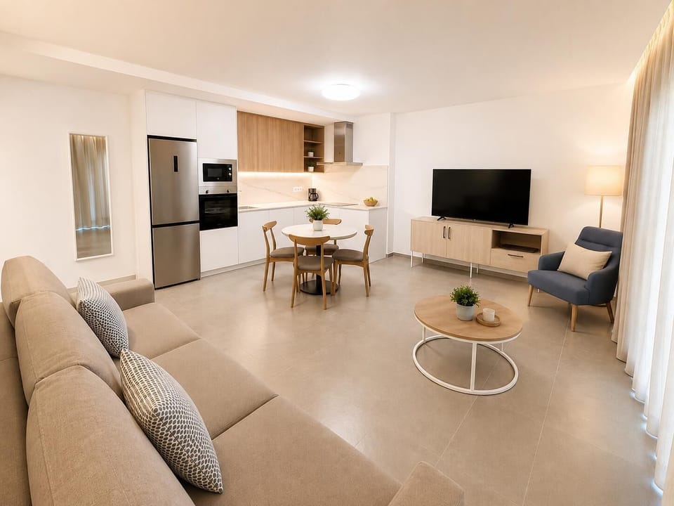 A bright modern living room with elegant neutral decor.