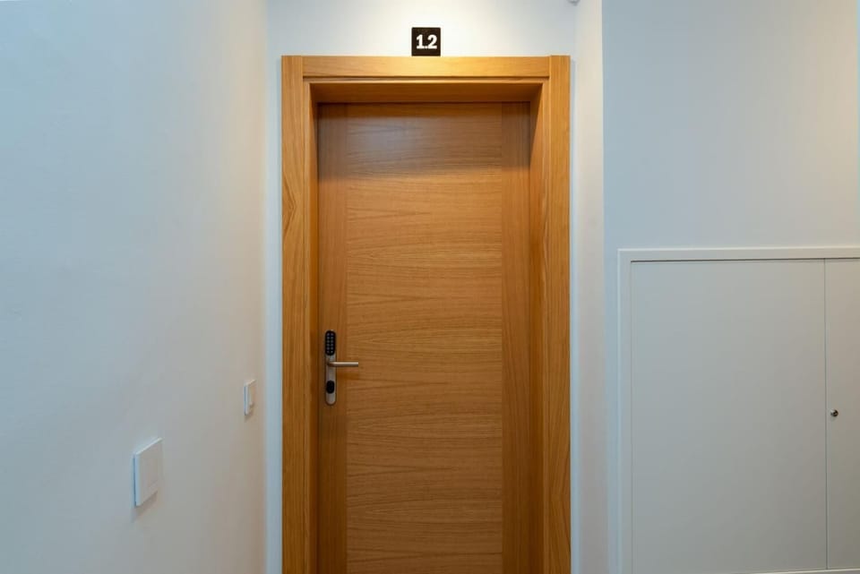 Secure private entrance with digital lock system.