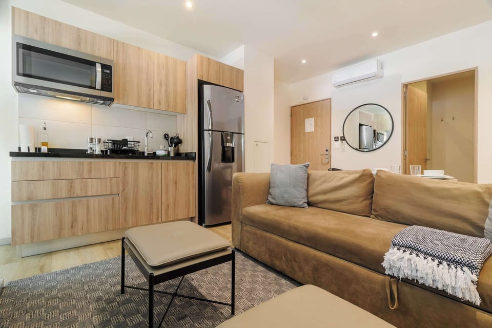 Modern living room connected to the kitchen.
