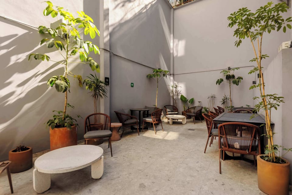 Charming terrace with warm lighting, perfect for unwinding and enjoying the fresh evening breeze.