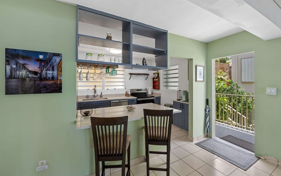 Front door leading right into the kitchen and dining area