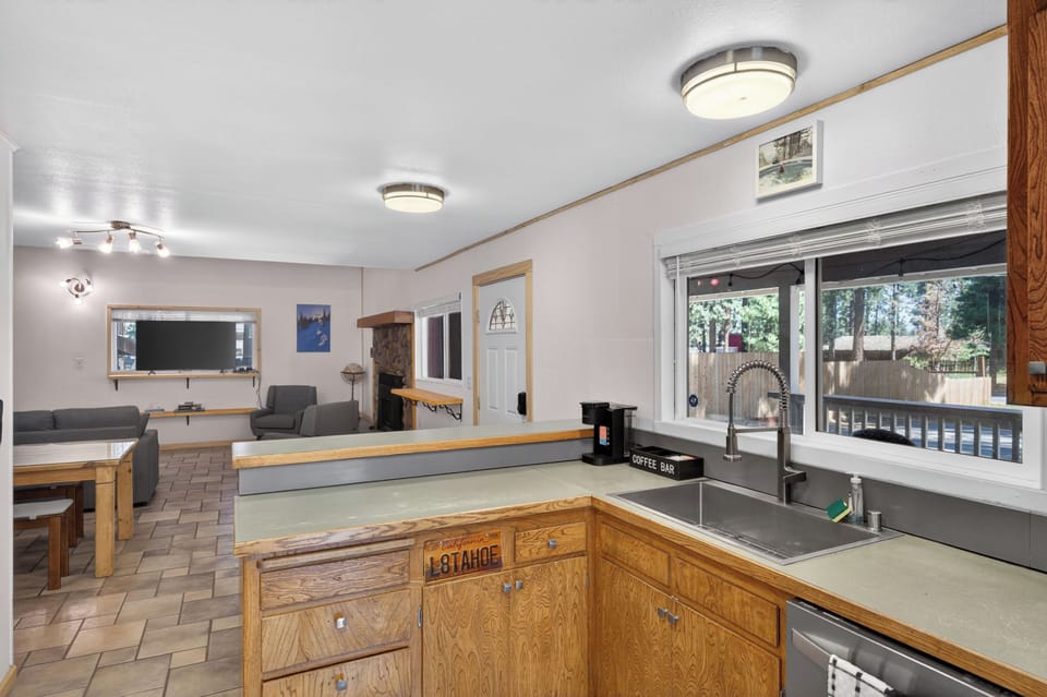 Whip up a meal without missing out on the conversation. The kitchen's open design looks directly into the main living area, keeping everyone connected while you prep for the day.