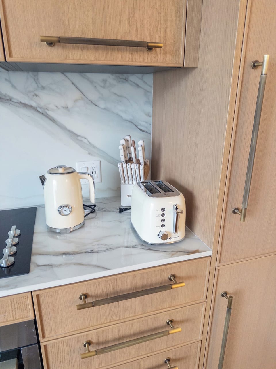 Fully equipped kitchen - marble counters, premium appliances and everyday essentials.