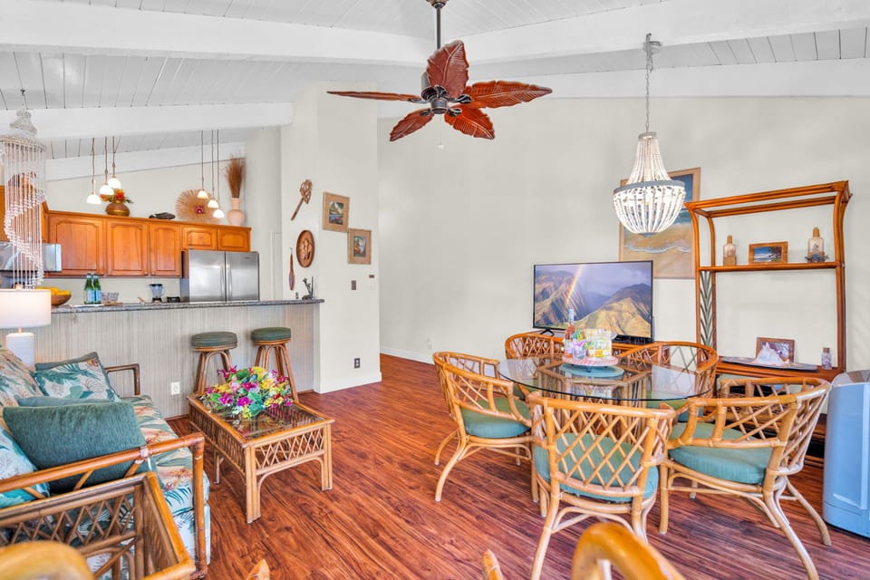 Charming great room with a full kitchen, bar seating, and inviting décor—perfect for sharing meals and memories. NAP-C37