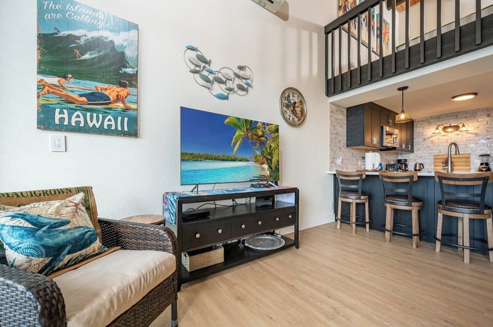 Retro surf vibes meet modern comfort in this cozy corner, with island flair, warm textures, and a beachy breeze     NAP-C43