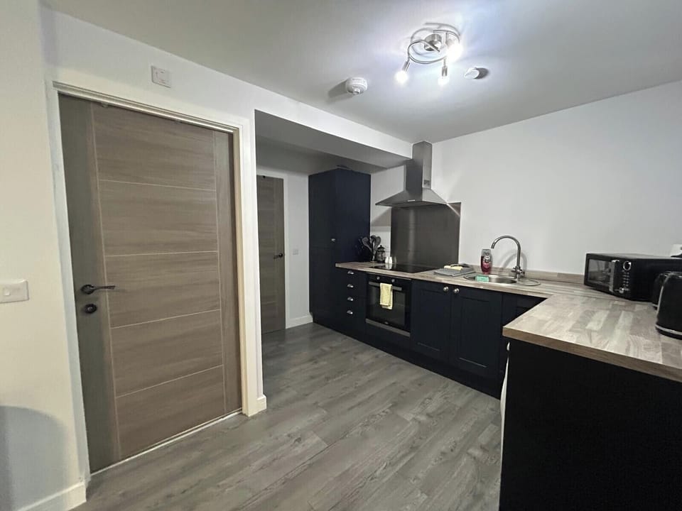 Kitchen — Fully equipped kitchen: oven, hob, microwave, washing machine