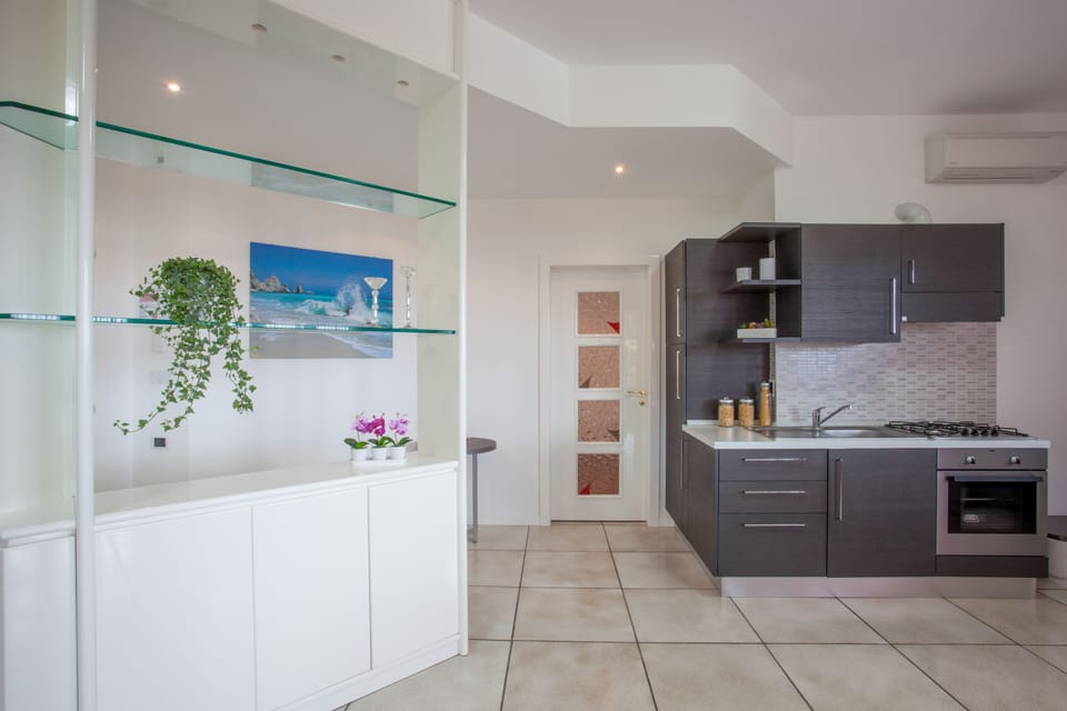 Panoramic Apartment, Terrace, Sea View | Living room | Flat-screen TV