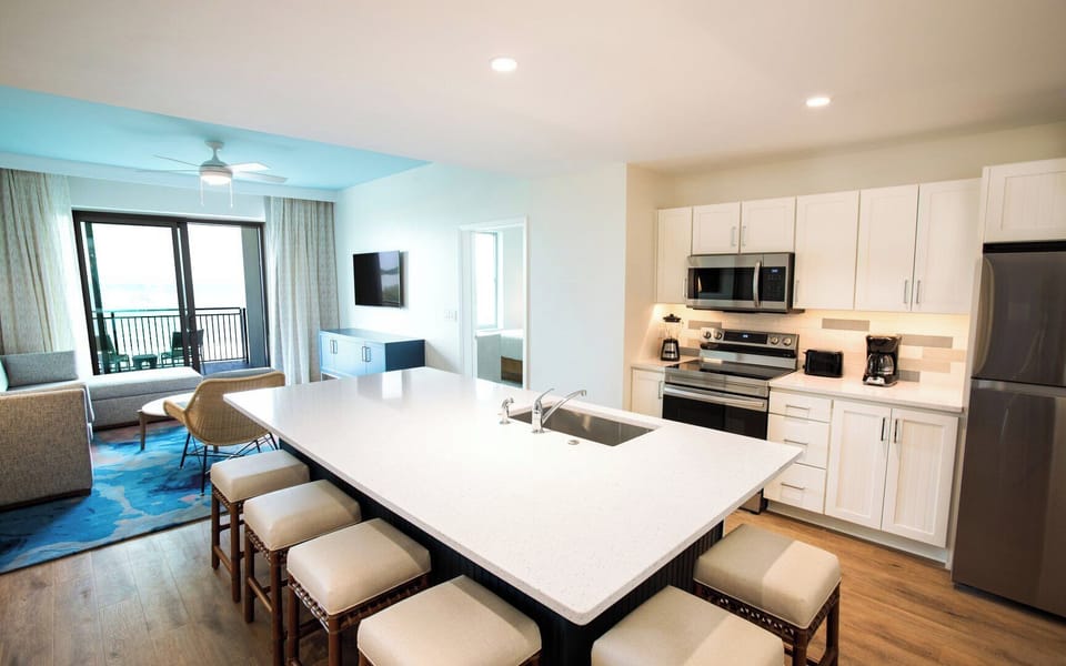 Full kitchen with a large island that includes seating.