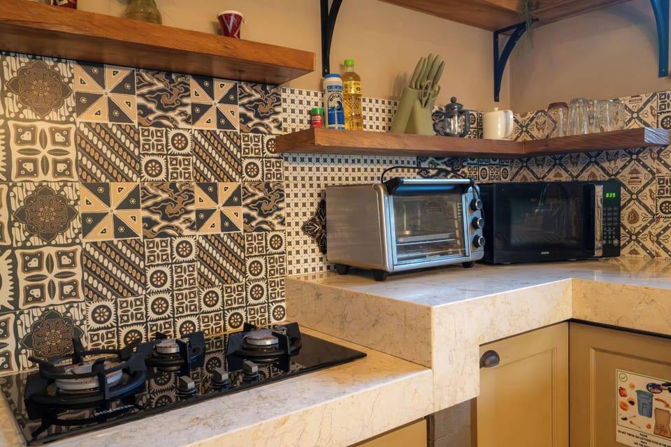 Villa | Private kitchen | Dining tables