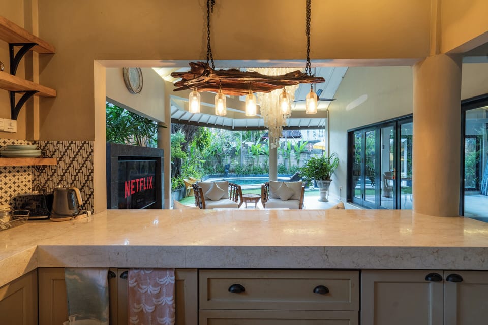 Villa | Private kitchen | Dining tables