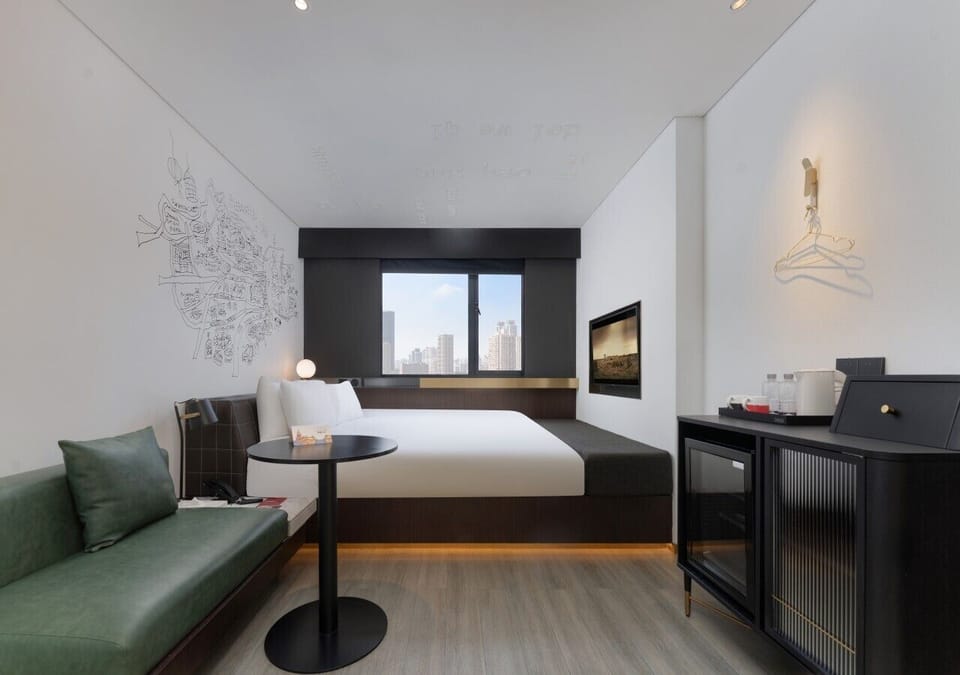 Superior Double Room, Non Smoking | Minibar (free items), desk, laptop workspace, blackout drapes