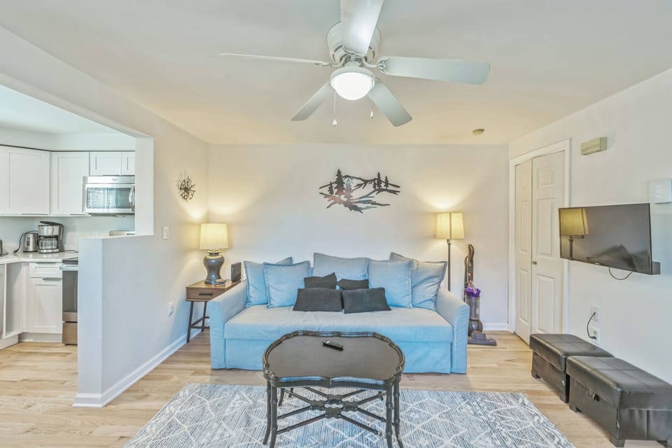 Relax in style—this sun-drenched living space is designed for ultimate comfort.