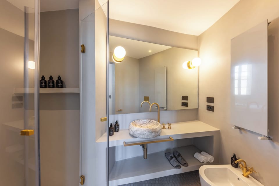 Deluxe Double Room, City View | Bathroom | Shower, hair dryer, slippers, towels