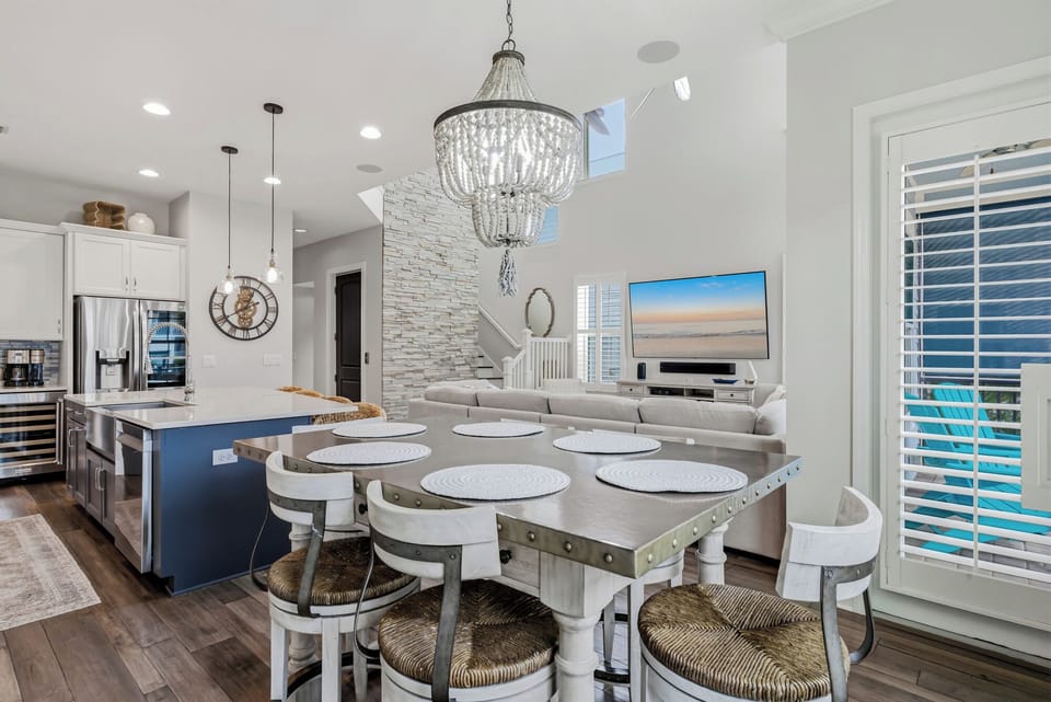 Dining area with a gulf view and coastal decor