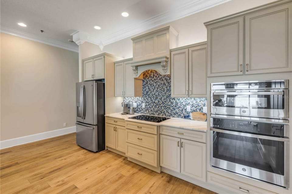 This inviting kitchen serves as the perfect gathering place for morning coffee, family meals, and making vacation memories