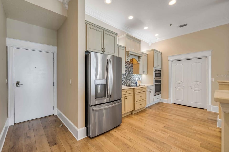 Spacious gourmet kitchen with premium appliances and custom cabinetry