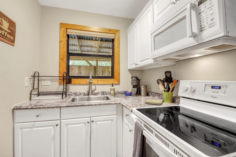 Your fully-equipped kitchen features granite countertops, modern appliances, and everything you need to whip up a home-cooked meal during your stay.