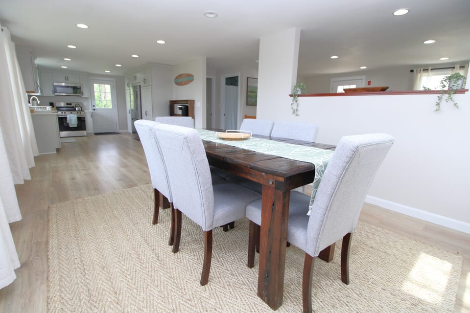 Dining Room with Kitchen in Background