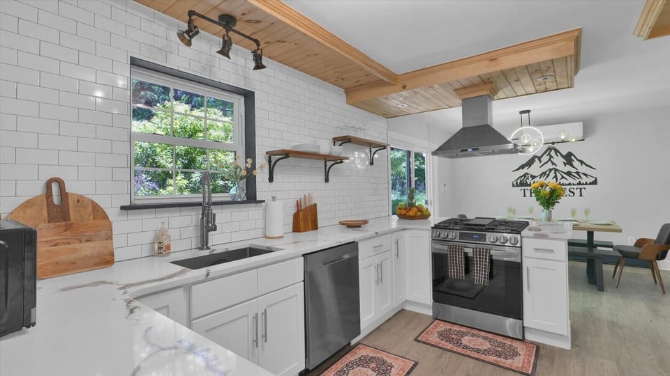 Spacious kitchen countertop perfect for meal prep, serving, and gathering.