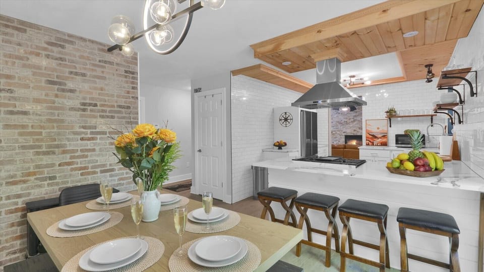 Kitchen peninsula with additional seating for 4, perfect for casual dining or morning coffee.