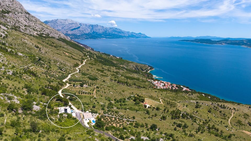 Charming property that offers stunning views of the sea, islands, and mountains