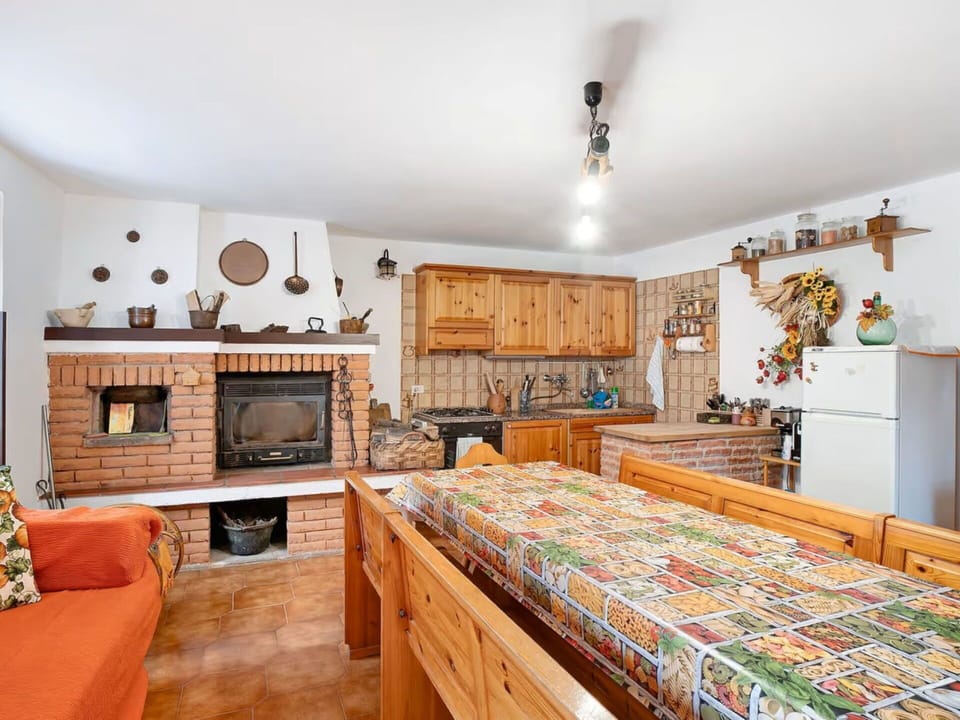 Furniture, Wood, Interior Design, Room, Table, Ceiling, Chair, Cabinetry, Wood Stain, Living Room