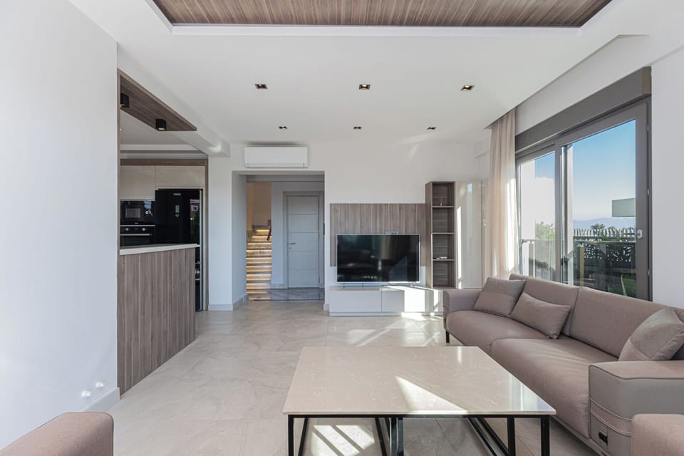 Comfort Villa, Balcony, Garden View | Living area