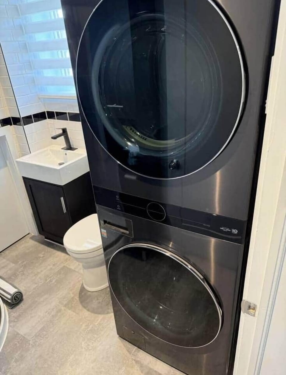 Bathroom with shower and laundry