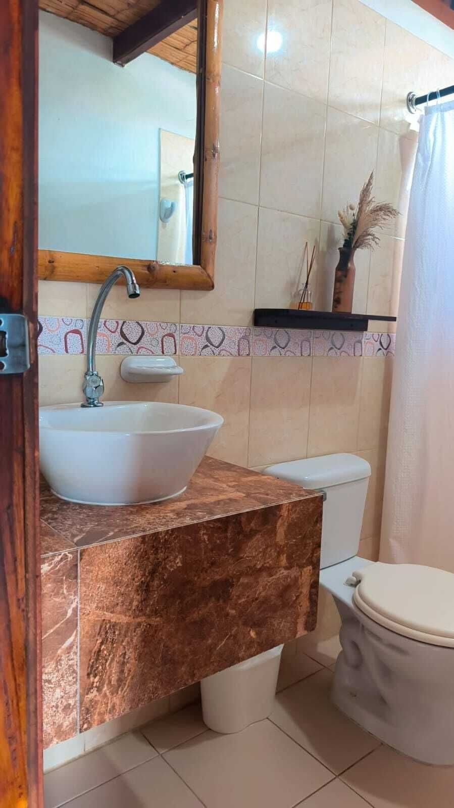 Suite, Ocean View | Bathroom | Shower, towels, soap, shampoo