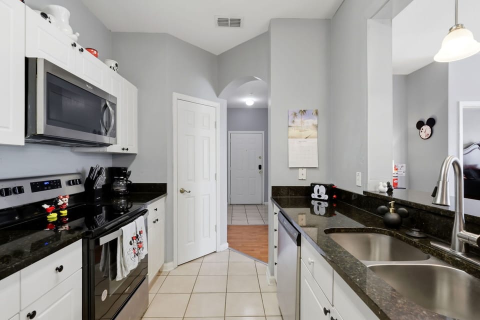 Open layout connecting the living, dining, and kitchen spaces