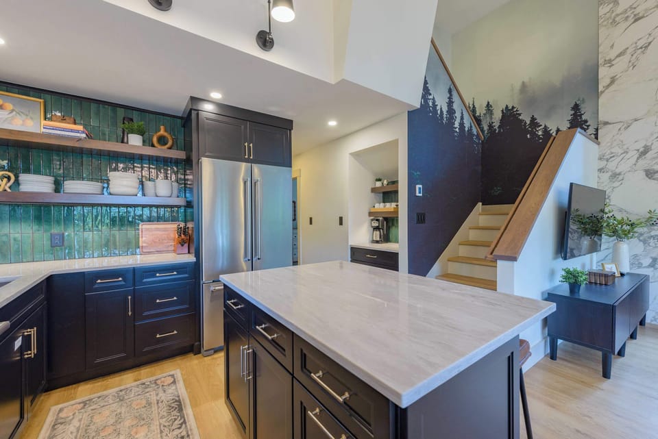 Kitchen, stairs to 2nd floor