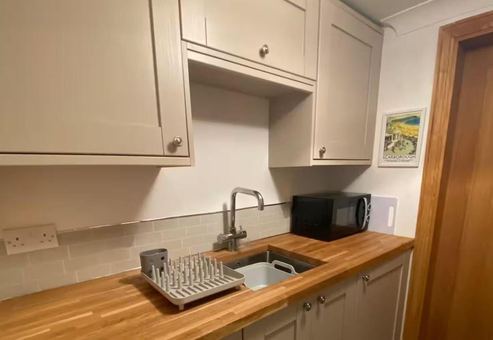 Fridge, microwave, electric kettle, toaster