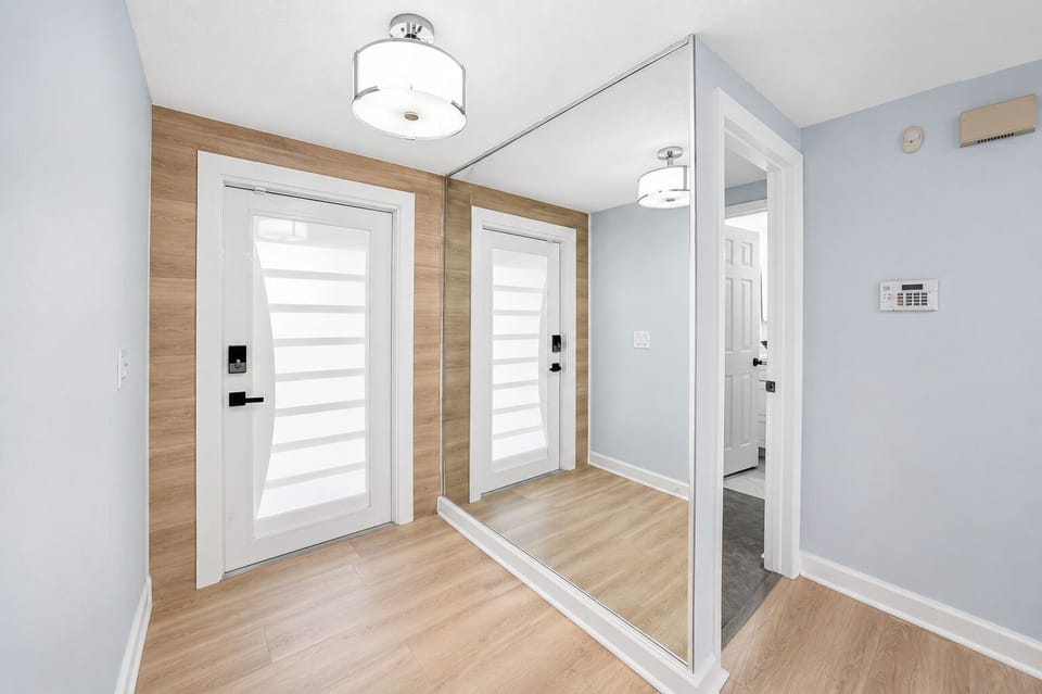 Welcoming entryway with smart lock access, providing a convenient and secure self-check-in experience.