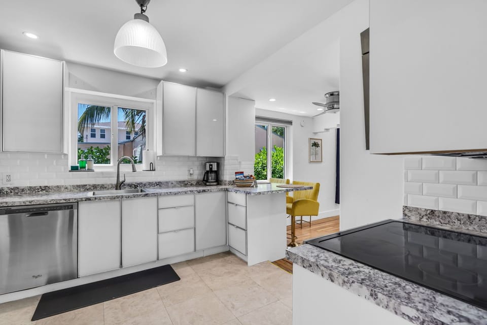 Prepare meals easily in a bright kitchen close to the main areas
