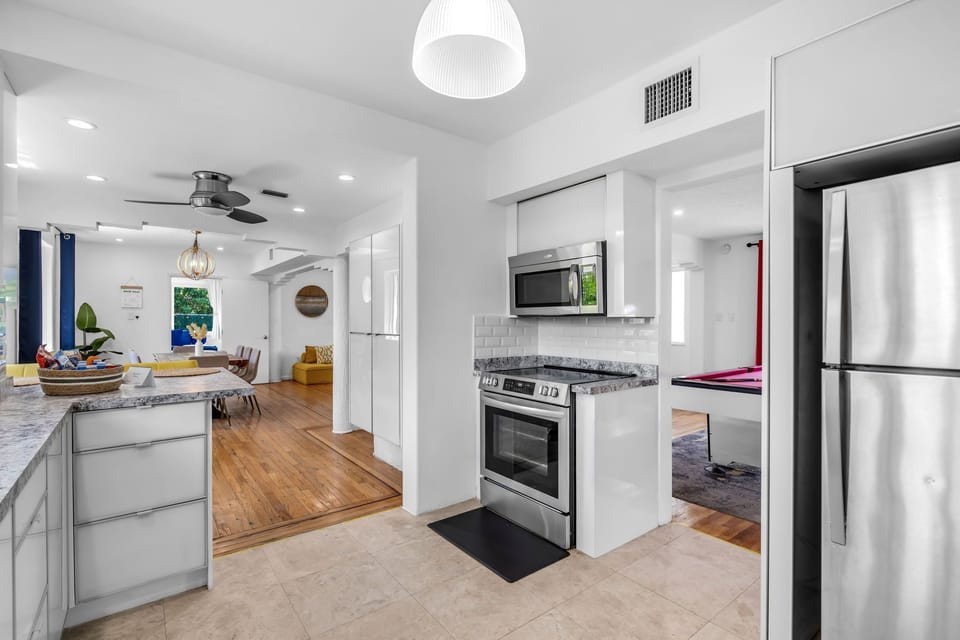Cook at home with full appliances and quick access to the living area