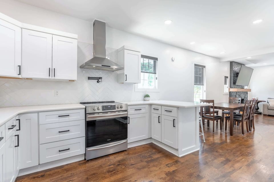 Seamless flow between the living, dining, and kitchen areas.