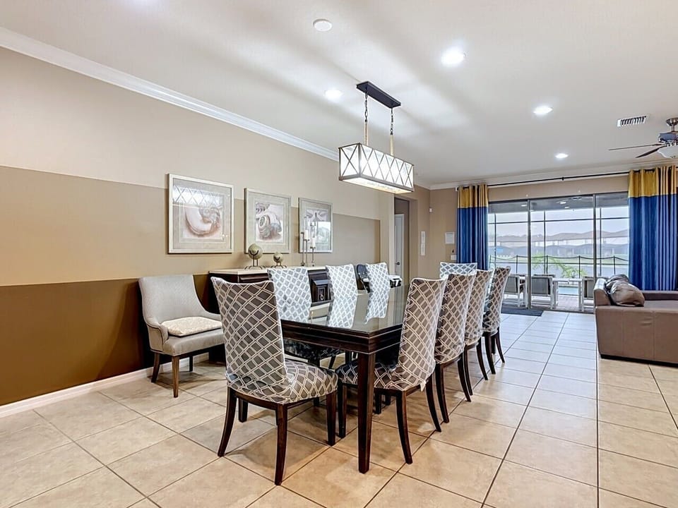 Elegant dining area with seating for the whole group, conveniently located beside the kitchen and living room.