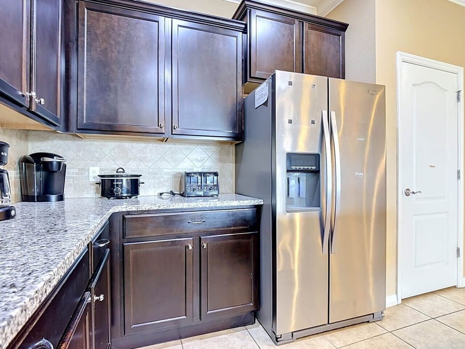 A well-equipped kitchen with ample counter space, modern appliances, and everything you need to prepare meals and snacks throughout your stay.