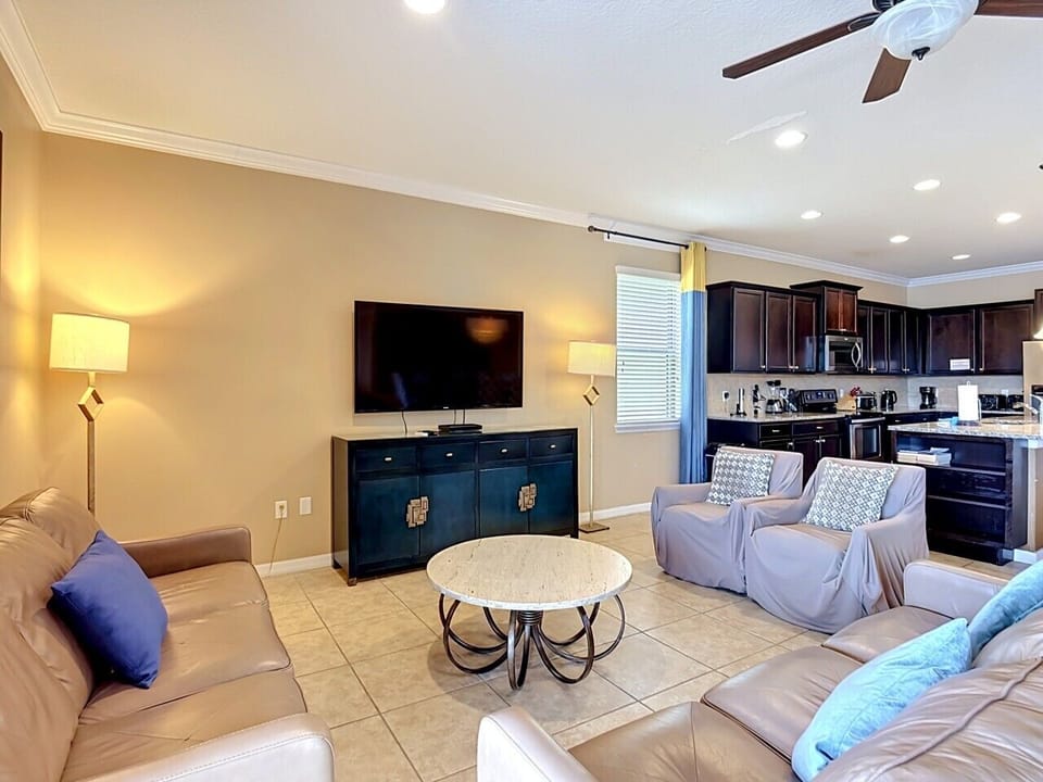 Open living room and fully equipped kitchen