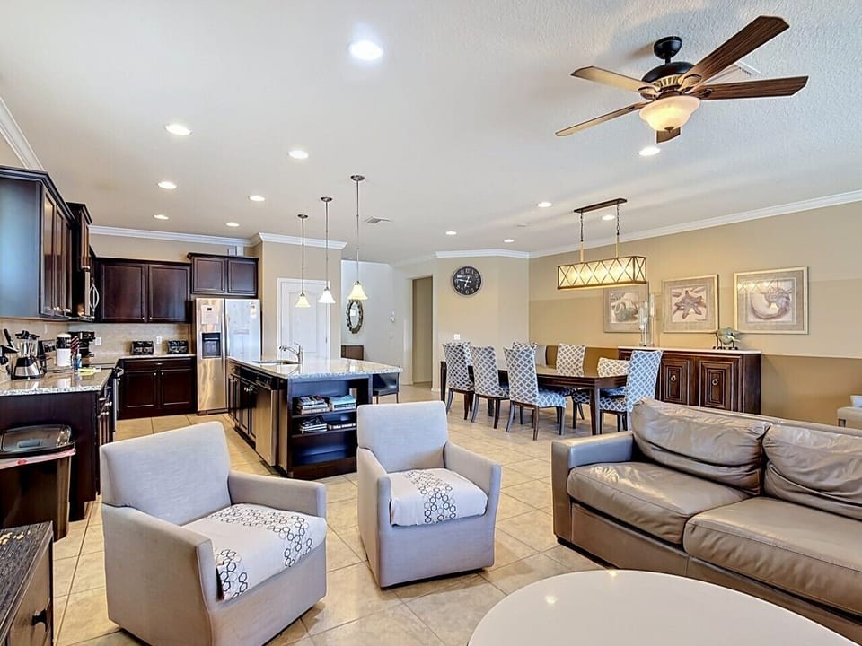 Comfortable living space with ample seating and an open layout ideal for relaxing and entertaining.