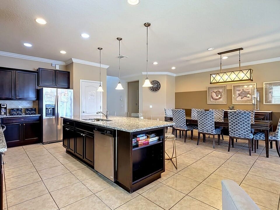Designed for gatherings! Seamlessly flow from the modern, fully equipped kitchen to the elegant formal dining table that comfortably seats