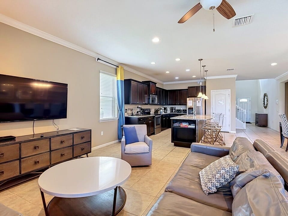 Gather for family movie night in the spacious living room