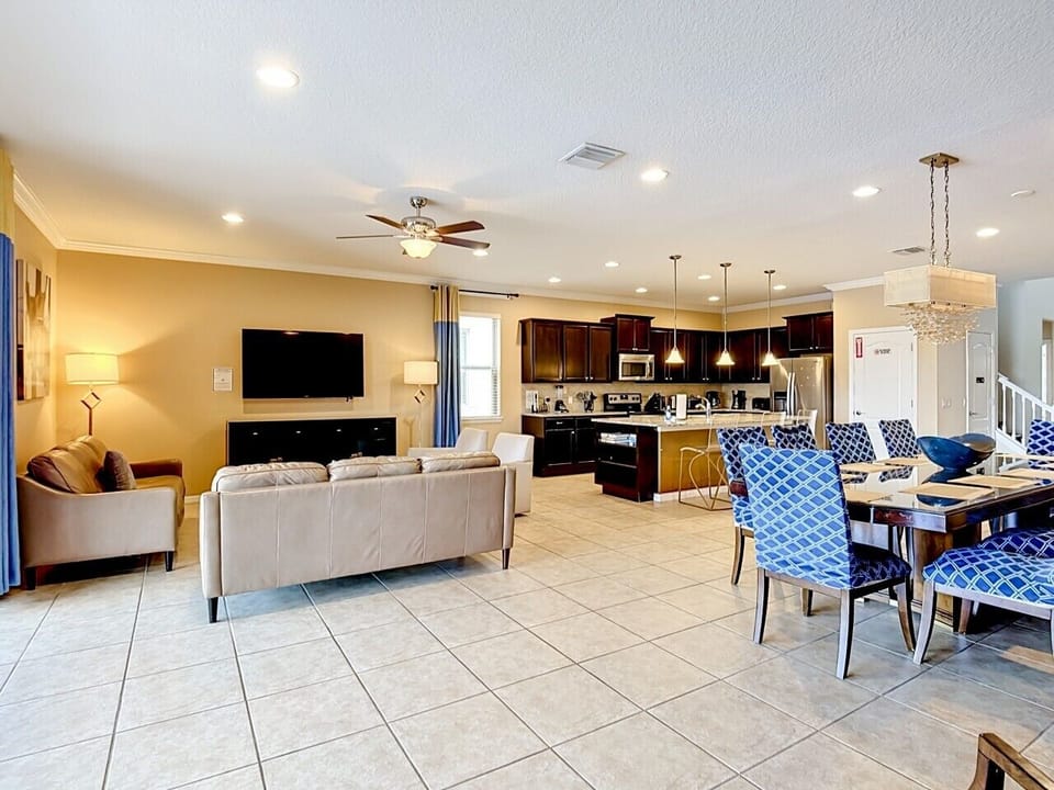 Broad Open-Concept View of Dining, Living Room, and Kitchen