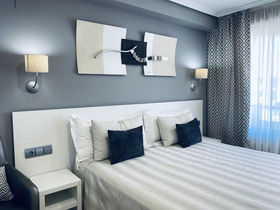 Double or Twin Room, Terrace, Partial Sea View | Premium bedding, individually decorated, individually furnished, desk