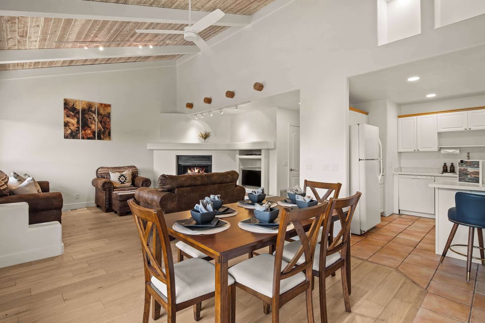 Open floor plan from the cozy living room to the dining table