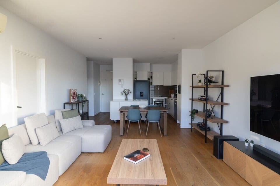 Experience the ultimate open-concept living, where you can stream your favorite shows from the plush sectional or gather around the dining table for an intimate dinner.