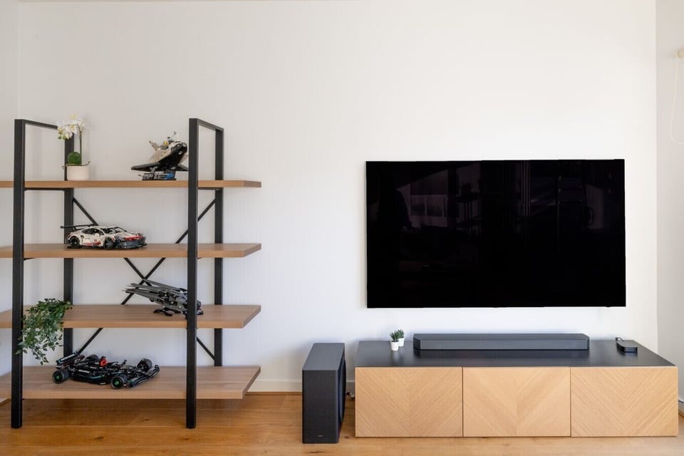 Host the perfect movie night with the large flat-screen TV and premium sound system, creating an immersive theater experience right from the comfort of the living room.